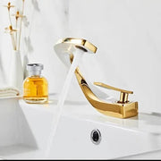 Twist Flow Faucet in Chrome & Gold